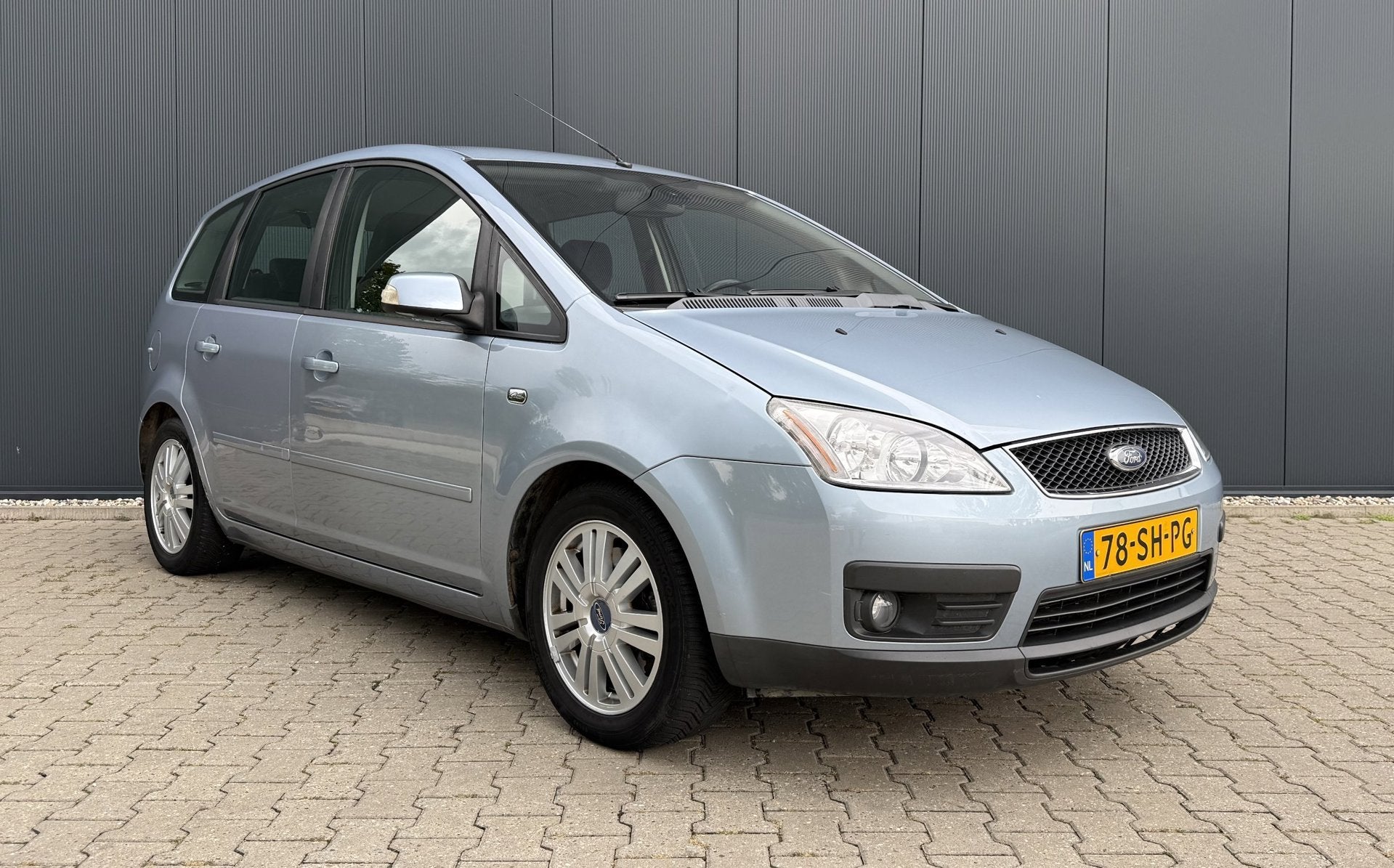 Ford Focus C-Max 2.0-16V Ghia Airco Cruise Navi PDC NAP APK, Stof, Gebruikt, 700 kg, Blauw