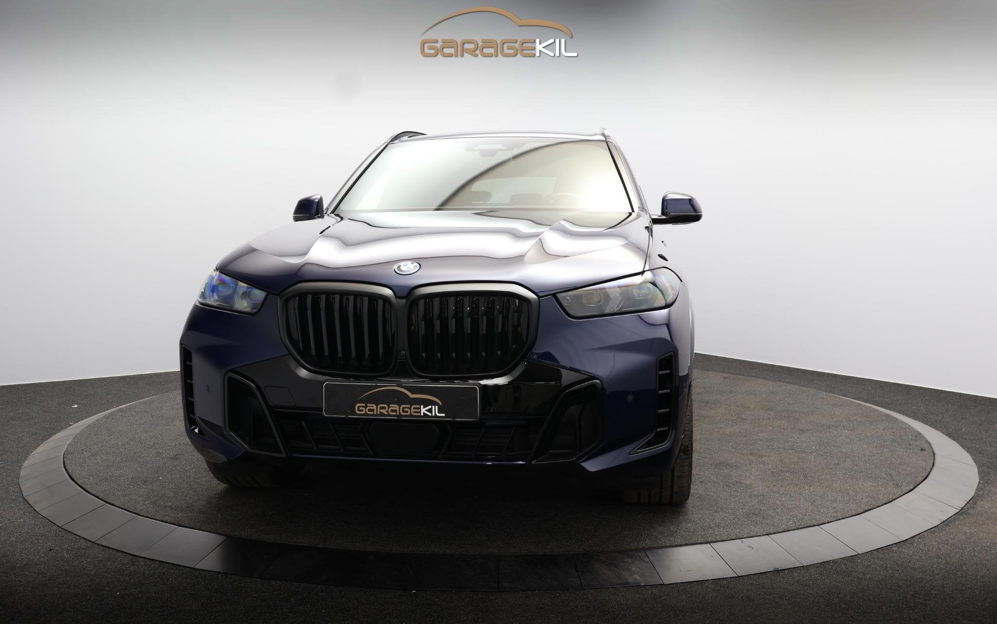 BMW X5 xDrive50e M-sport Pro / Dealeronderh / Comfort Stoele, Auto's, Automaat, Gebruikt, 2395 kg, Blauw