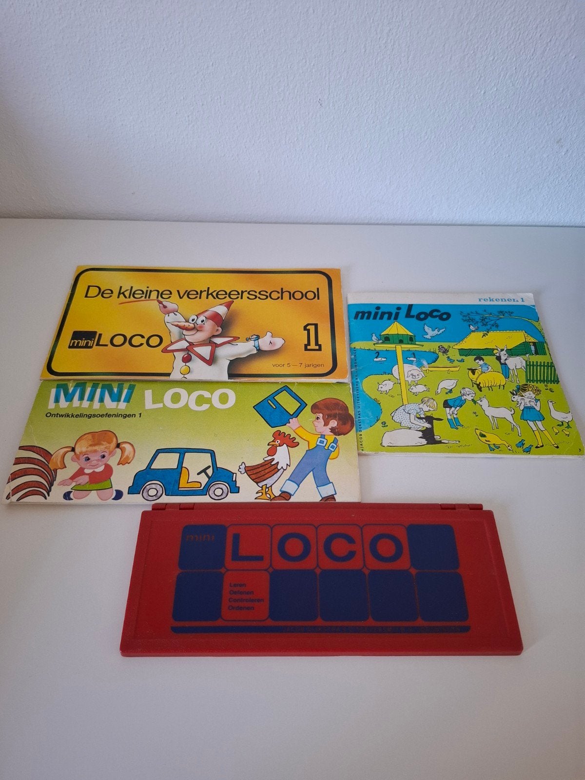 Loco met enkele spelboekjes, Ophalen, Gebruikt, Puzzelen