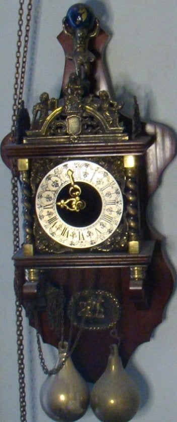 Prachtige antieke wandklok, Ophalen