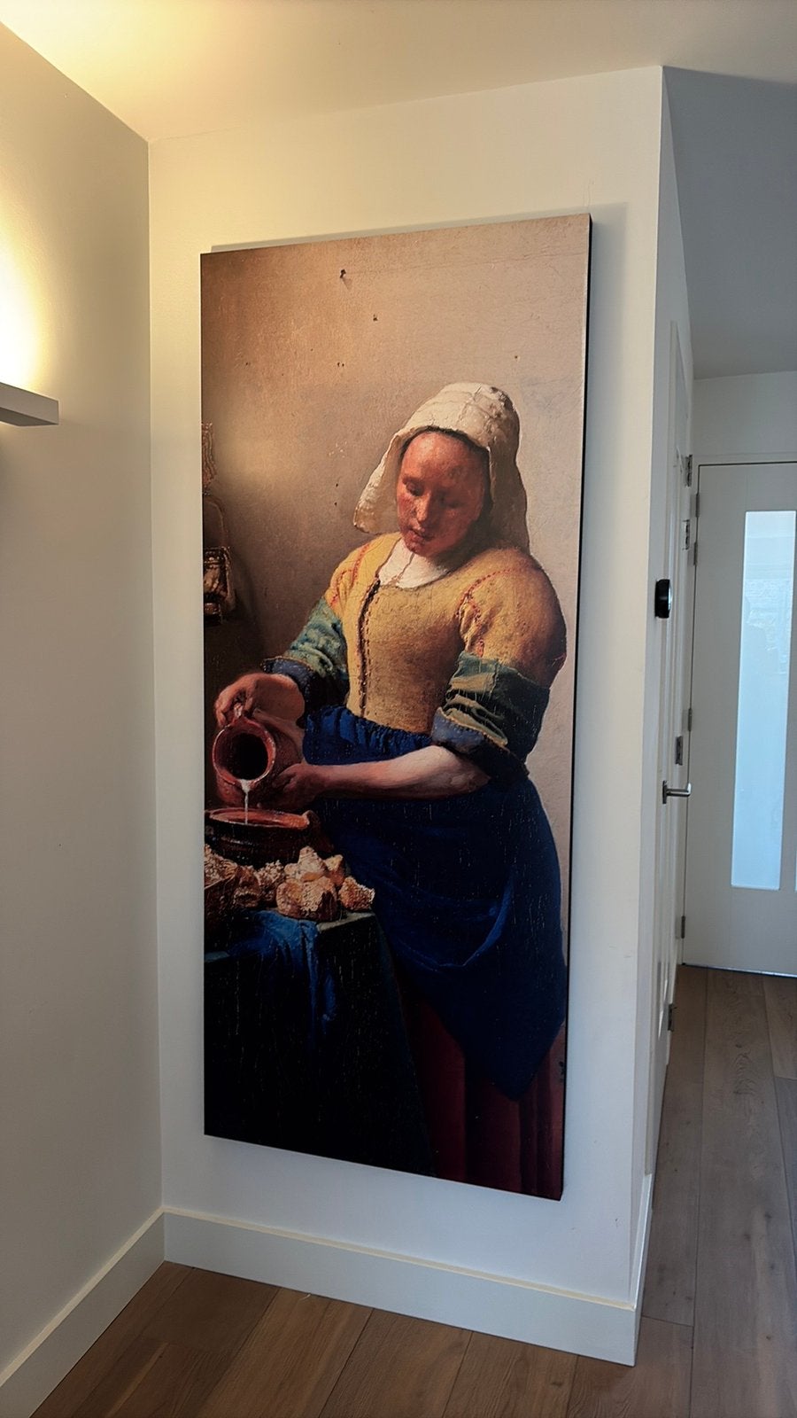 Groot schilderij melkmeisje op hout, Ophalen