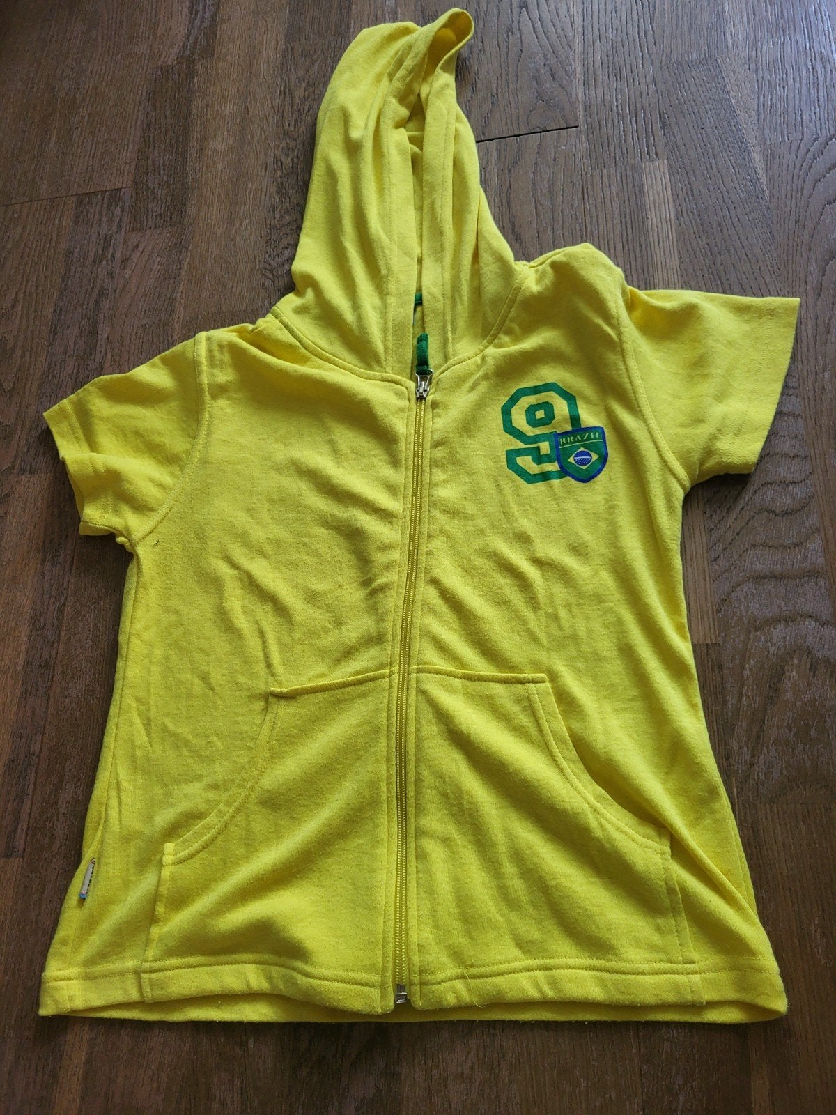 Geel shirt met korte mouw en capuchon - Brazil - Maat L, Kleding | Dames, T-shirts, Maat 38/40 (M), Flag Football, Geel, Ophalen of Verzenden