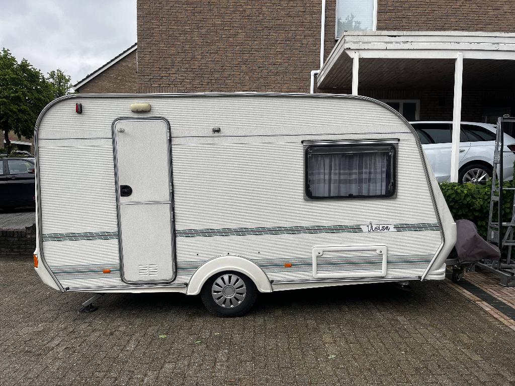 Caravan Hylander Vision 380, Tot en met 2, Luifel, Treinzit, 750 - 1000 kg