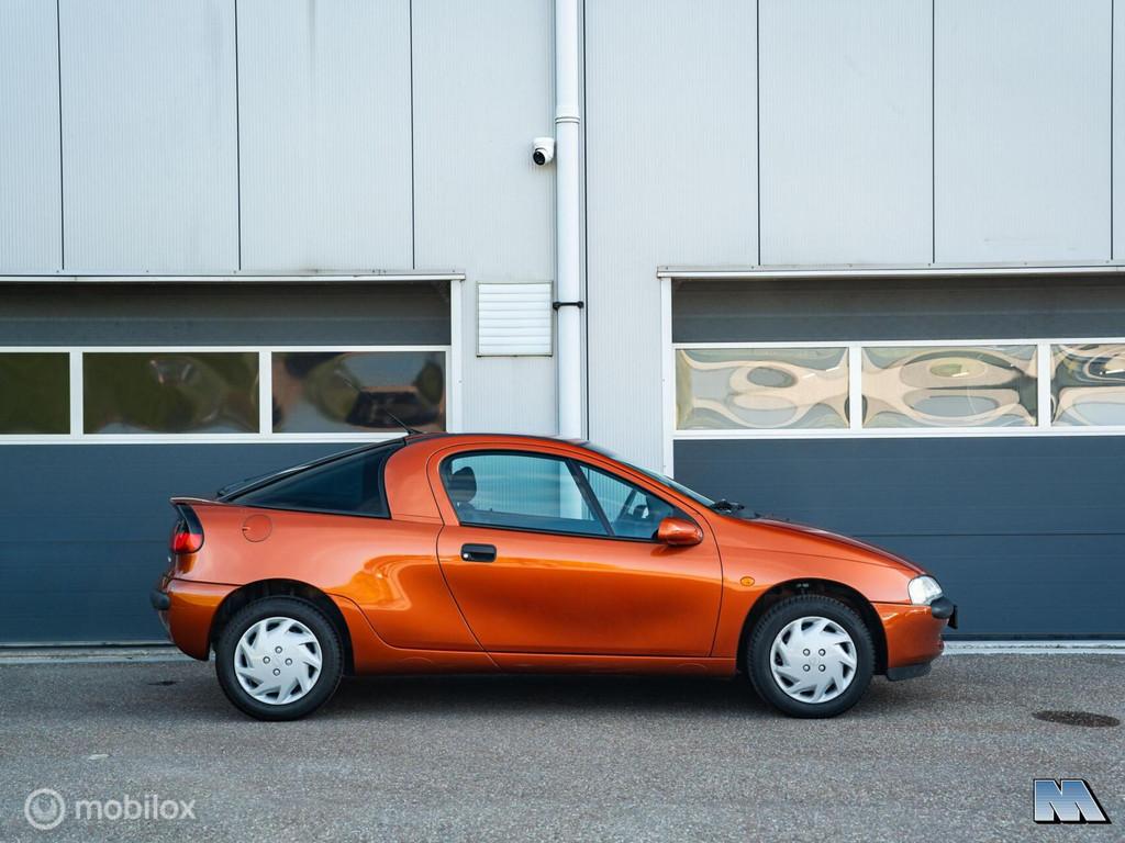 Opel Tigra 1.4i-16V | 1e eign. | Apache Metallic | ZGAN, Voorwielaandrijving, Stof, Gebruikt, Zwart