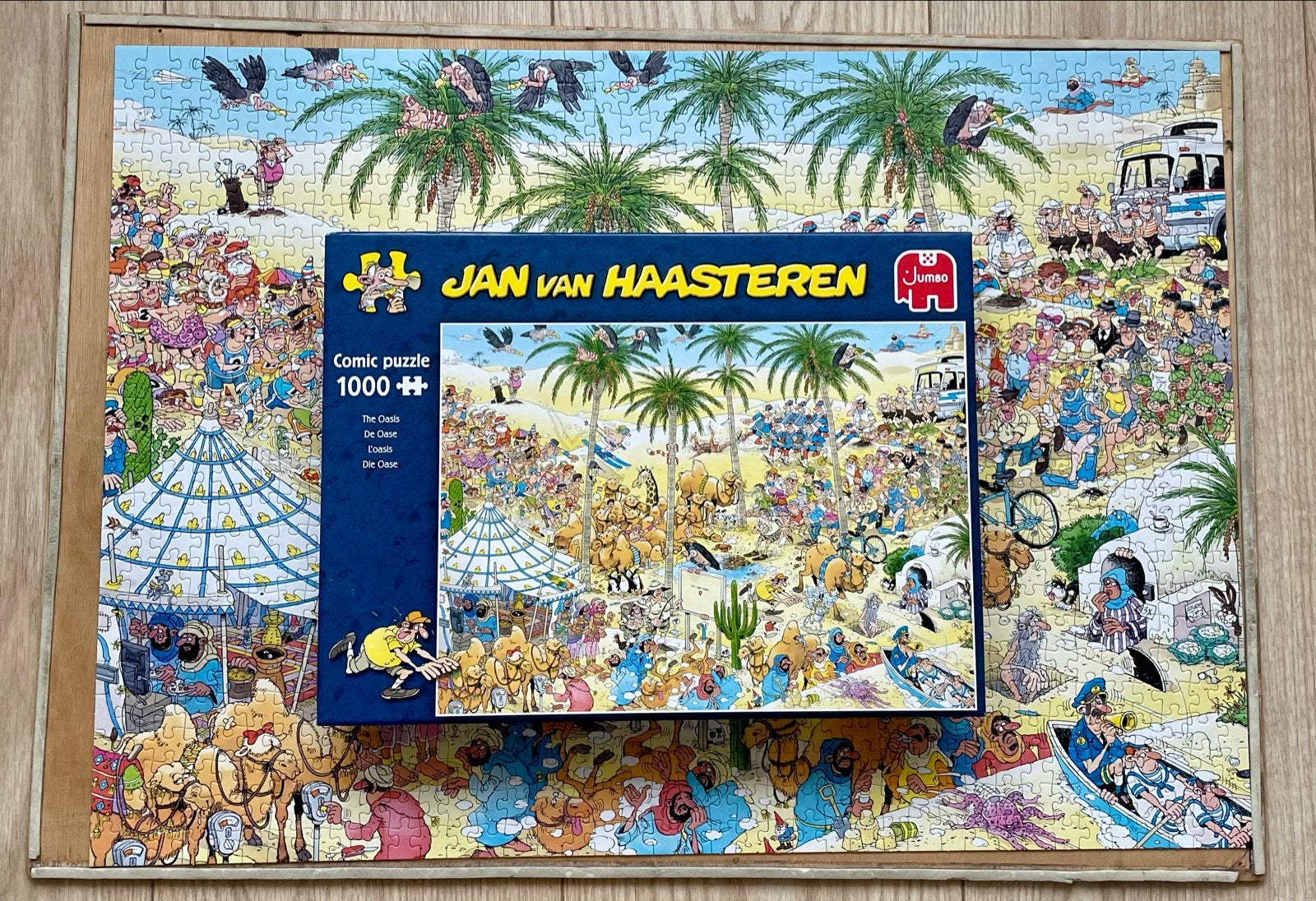 Jan van Haasteren puzzel 1000 stukjes:    DE OASE., Hobby en Vrije tijd, Ophalen of Verzenden, 500 t/m 1500 stukjes, Zo goed als nieuw