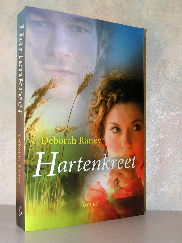 Deborah Raney - Hartenkreet (christelijke roman), Ophalen of Verzenden, Zo goed als nieuw