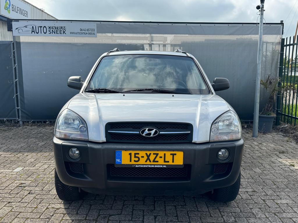 Hyundai Tucson 2.0i Dynamic - NWE APK - Airco - Cruise, Auto's, Hyundai, Stof, Gebruikt, Zwart, 4 cilinders