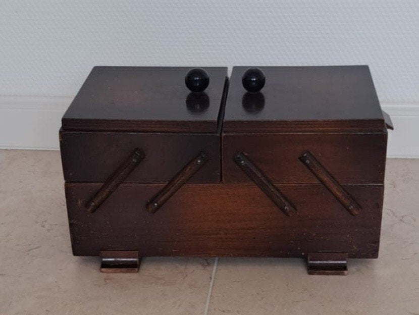 Houten naaikistje, Ophalen