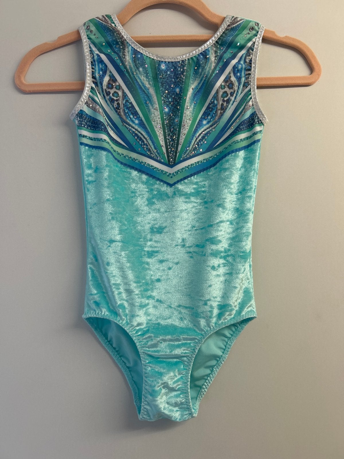 nieuw turnpakje maat 128 - licht blauw/mint glitter, Kindermaat 122 t/m 140, Ophalen of Verzenden, Nieuw, Turnpak(je)