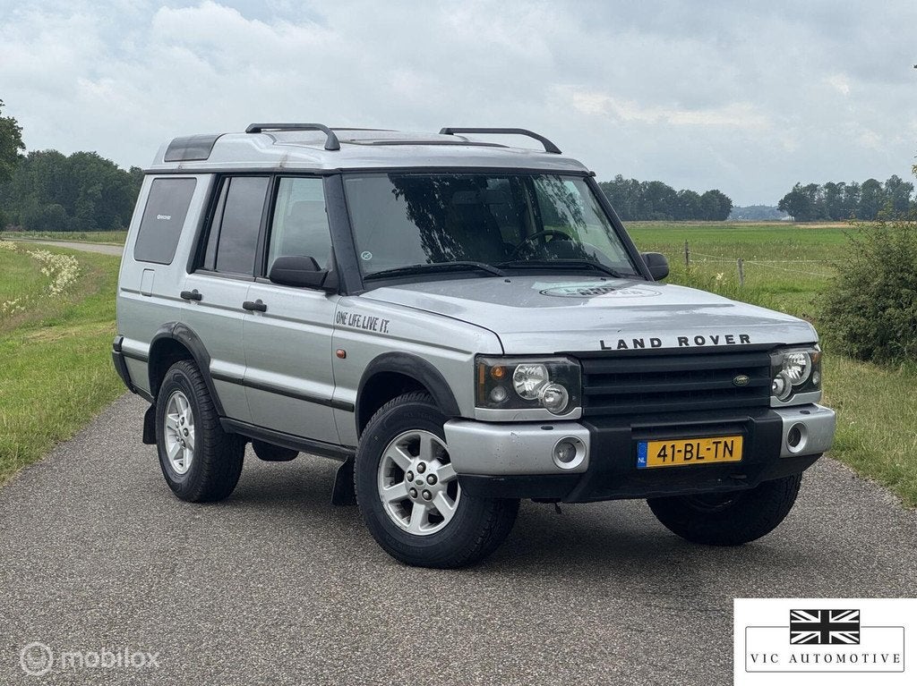 Land Rover Discovery 2.5 Td5 HSE overlander vakantie auto, Auto's, Automaat, Stoelverwarming, Zwart, 143 pk