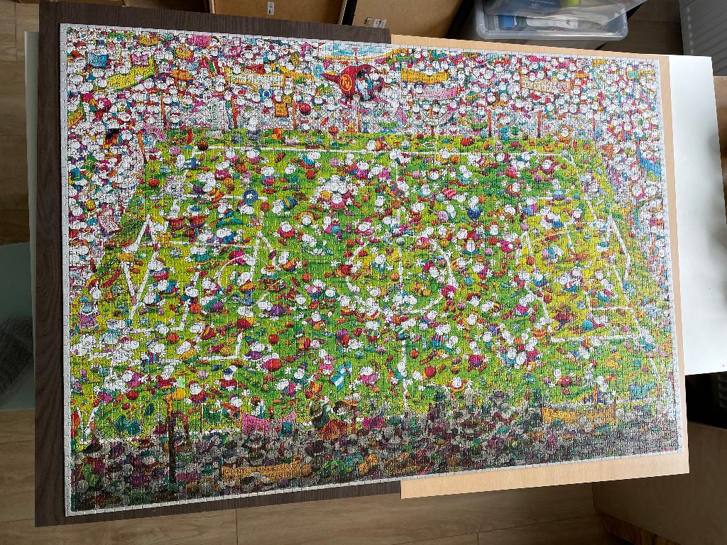 Puzzel 4000 stukjes Heye Mordillo "Crazy World Cup", Hobby en Vrije tijd, Denksport en Puzzels, Ophalen of Verzenden, Meer dan 1500 stukjes