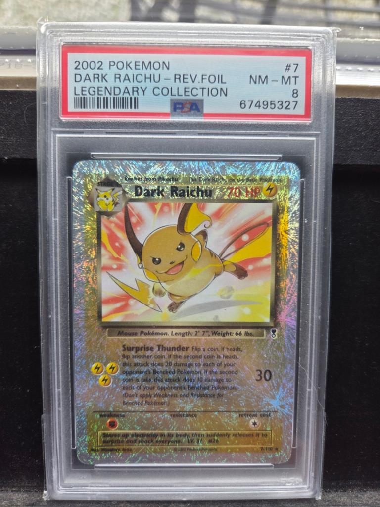 Dark raichu legendary collection psa 8, Hobby en Vrije tijd, Verzamelkaartspellen | Pokémon, Ophalen of Verzenden, Zo goed als nieuw