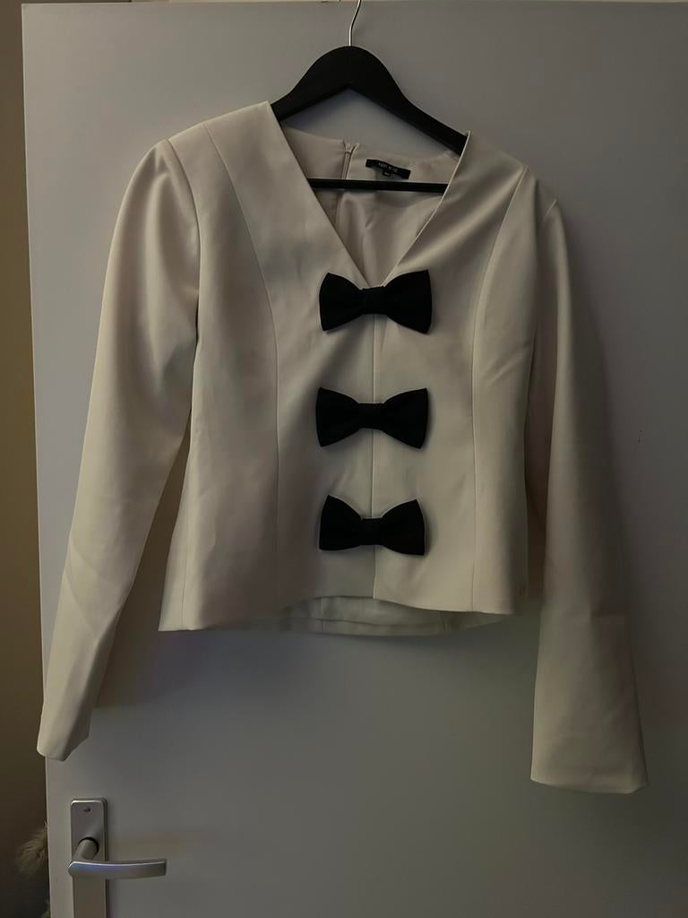 Nikkie top met zwarte strikken, maat L, Ophalen of Verzenden, Nieuw, Beige