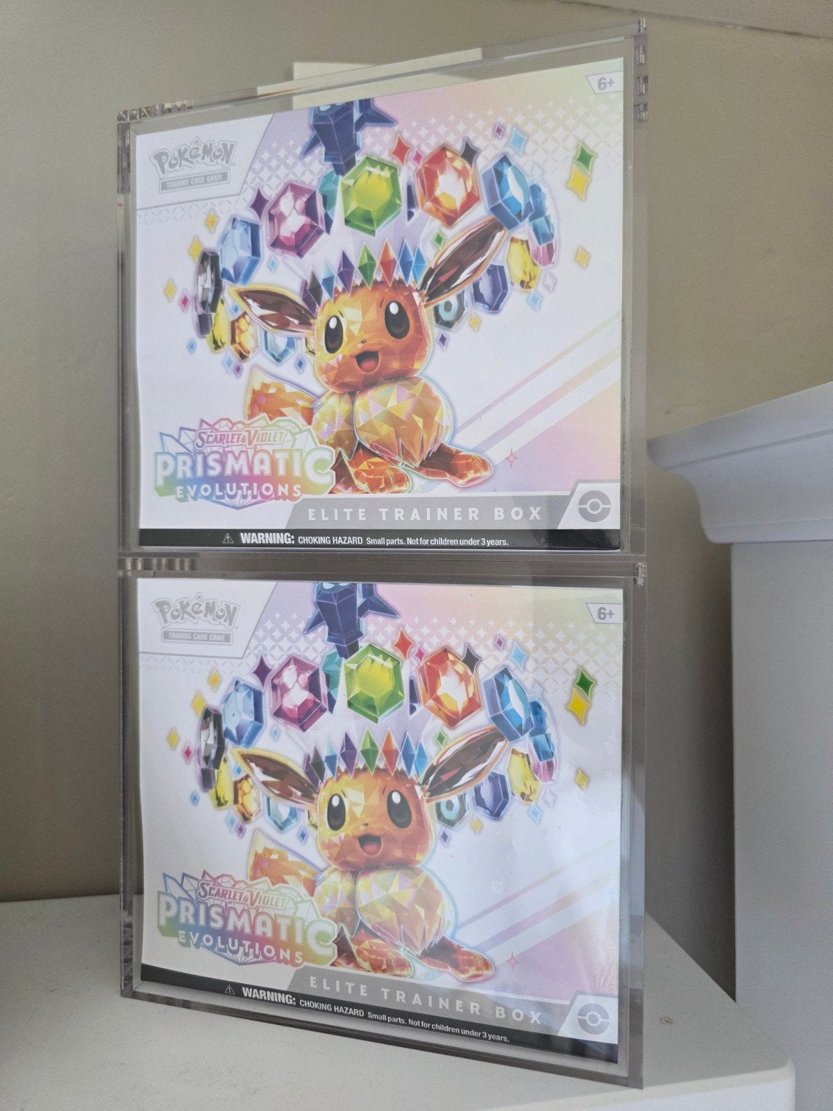 Pokémon Prismatic Evolutions Elite Trainer box, Ophalen of Verzenden, Nieuw, Overige typen