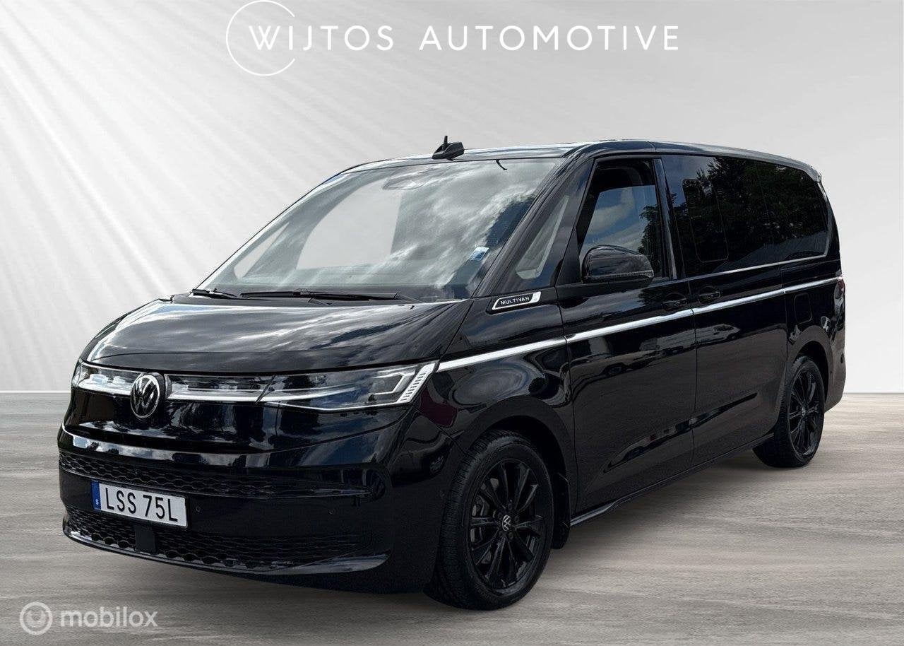 Volkswagen Multivan 1.5 eHybrid L2 4M Good Night Package, Auto's, Volkswagen, Automaat, 7 stoelen, Zwart, Bedrijf