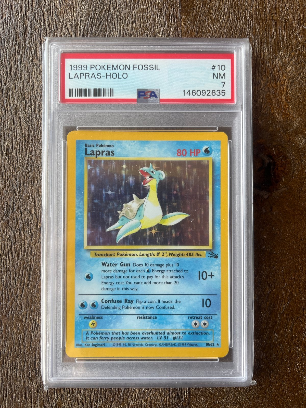 Pokémon Lapras Holo #10 Fossil PSA 7 NM, Ophalen of Verzenden, Zo goed als nieuw, Losse kaart, Foil