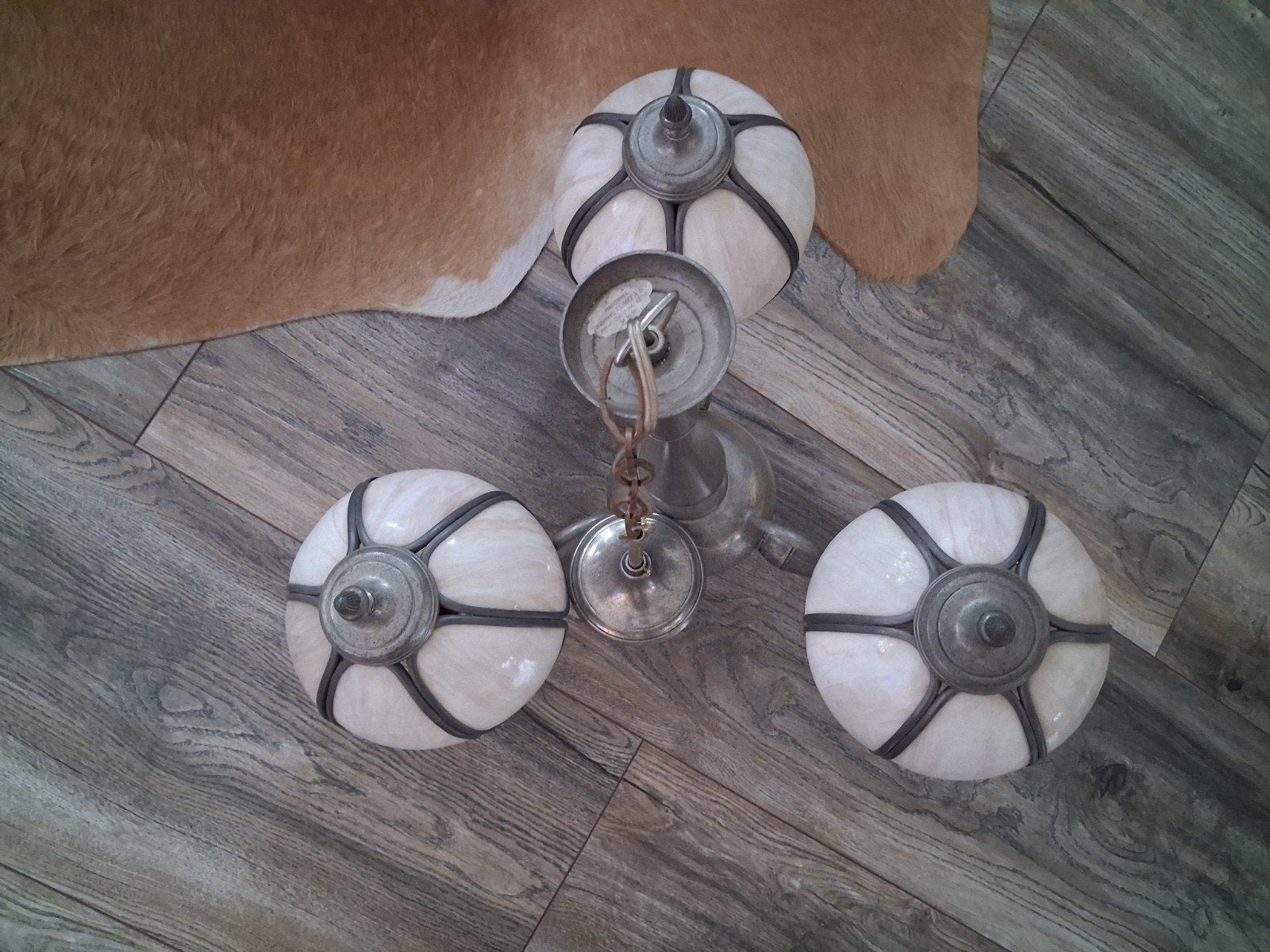 Echte tinnen lamp, Ophalen