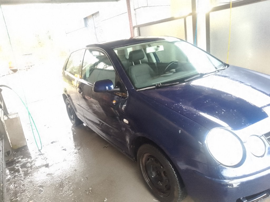 Volkswagen Polo 1.4 55KW AUT 2004 Blauw, Stof, 74 pk, Zwart, Blauw
