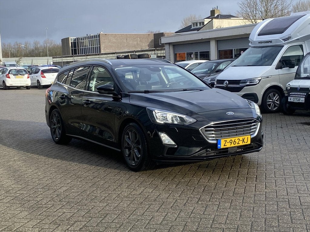 FORD Focus Wagon 1.0 EcoBoost 125pk Aut Titanium Business, 12 maanden, 125 pk, Gebruikt, Leder en Stof