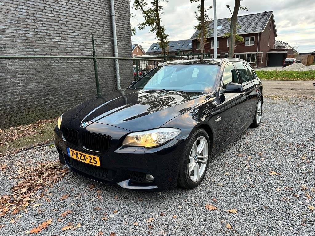 Foto 5 van BMW 5-serie Touring 520i High Executive netteauto/keurigonde