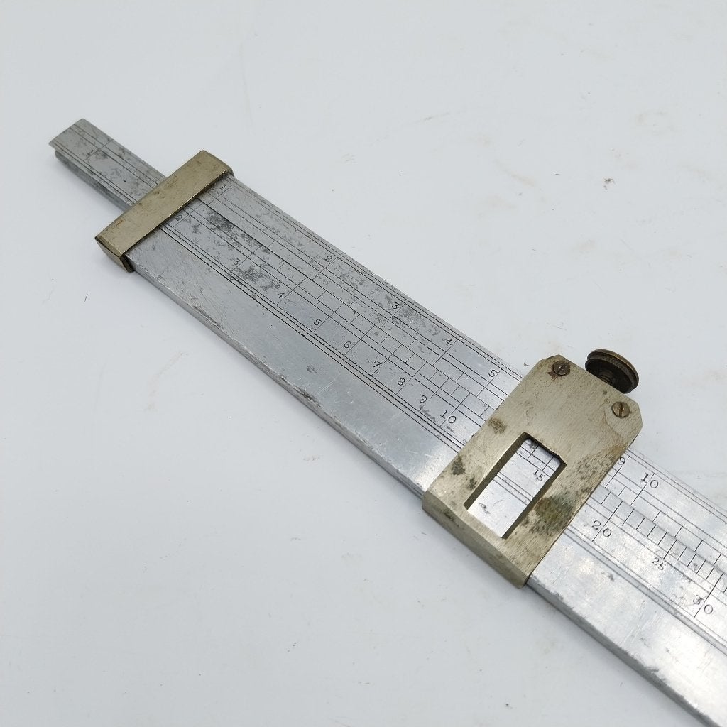 Metalen rekenliniaal uit het Engelse leger 1918 (58535-ML), Ophalen of Verzenden
