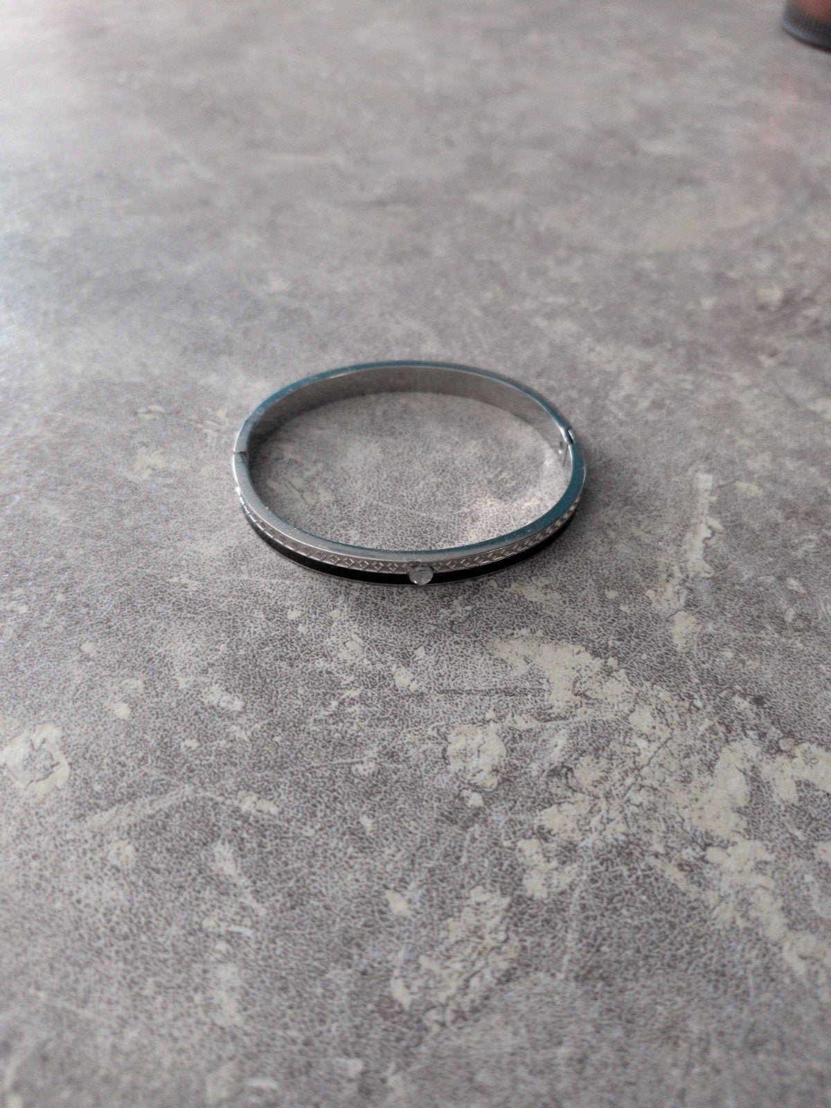 Te koop armband (m/v/x) van staal, Ophalen of Verzenden, Zo goed als nieuw, Overige typen