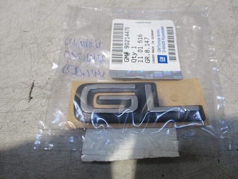 EMBLEEM embleem gl Opel Corsa A (01-1970/-) (90214475), Auto-onderdelen, Bahnhofsplatz 65423 Rüsselsheim am Main, DE, Gebruikt