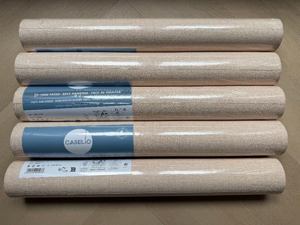 Nieuw! 5 rollen Caselio  vliesbehang zalm oranje jute, Ophalen, Geel