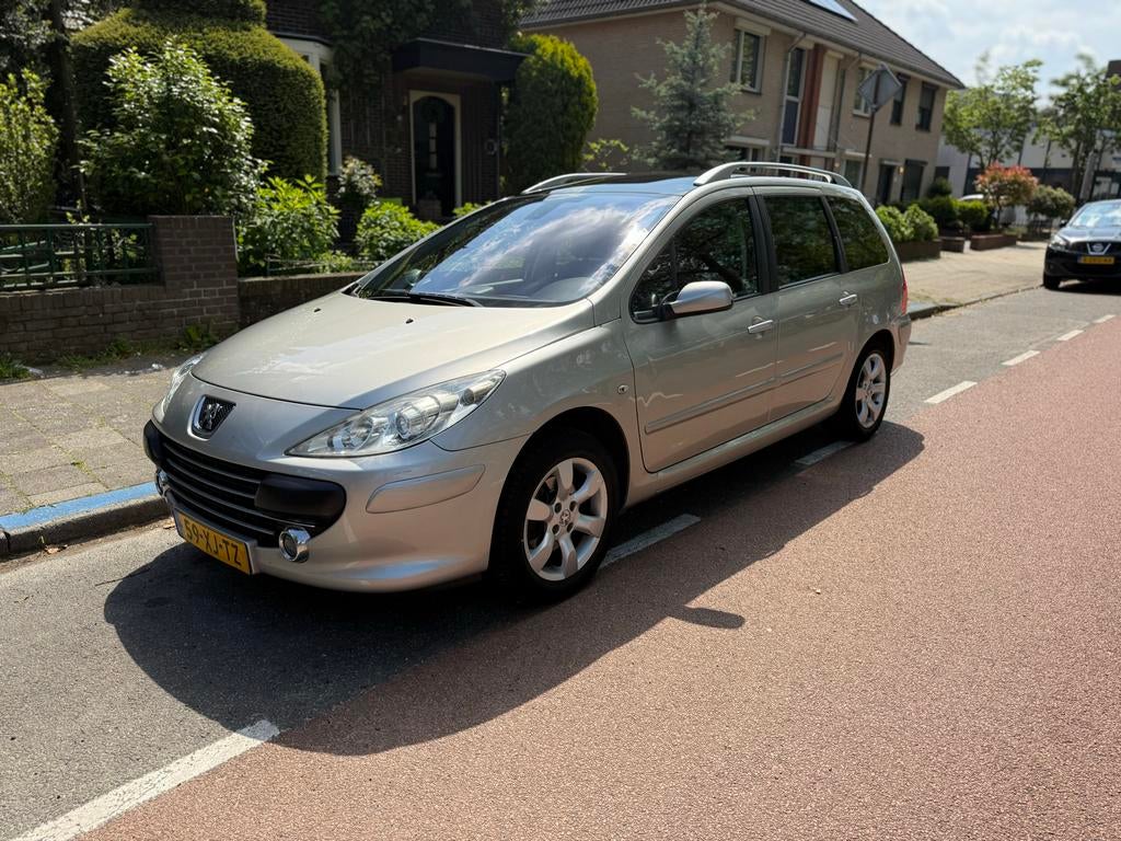 Peugeot 307 2.0 16V SW 2007 Grijs, Auto's, 730 kg, 4 cilinders, 7 stoelen, Origineel Nederlands