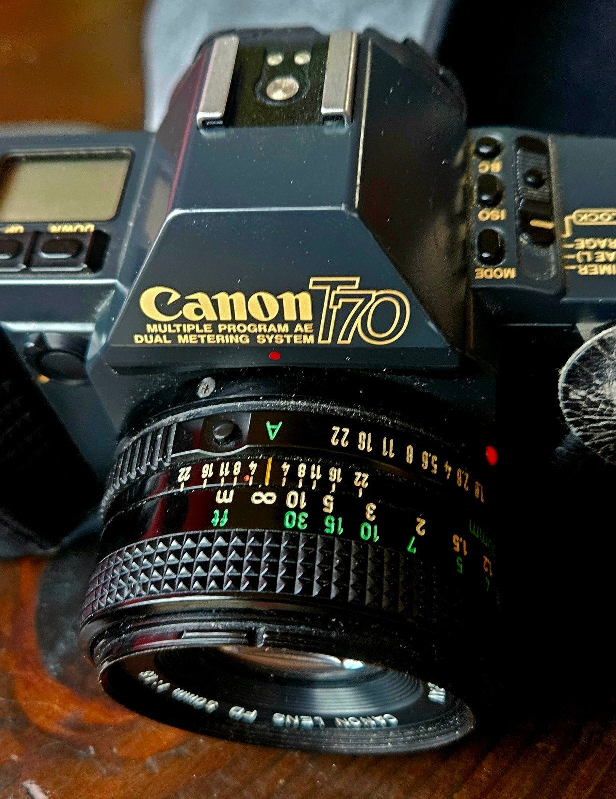 Vintage Canon camera T70 + lenzen en Flitser
