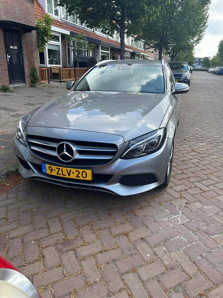 Mercedes-Benz C-Klasse C220 CDI 2.1 125KW Estate 2015 Grijs, Auto's, Achterwielaandrijving, 1800 kg, 4 cilinders, 23 km/l