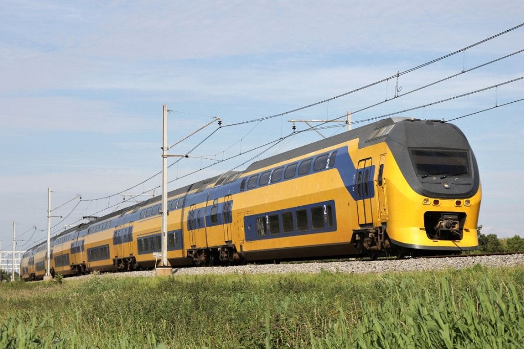 NS Trein fotobehang VINYL, treinenbehang, op maat gemaakt, Verzenden, Fotobehang, Paars