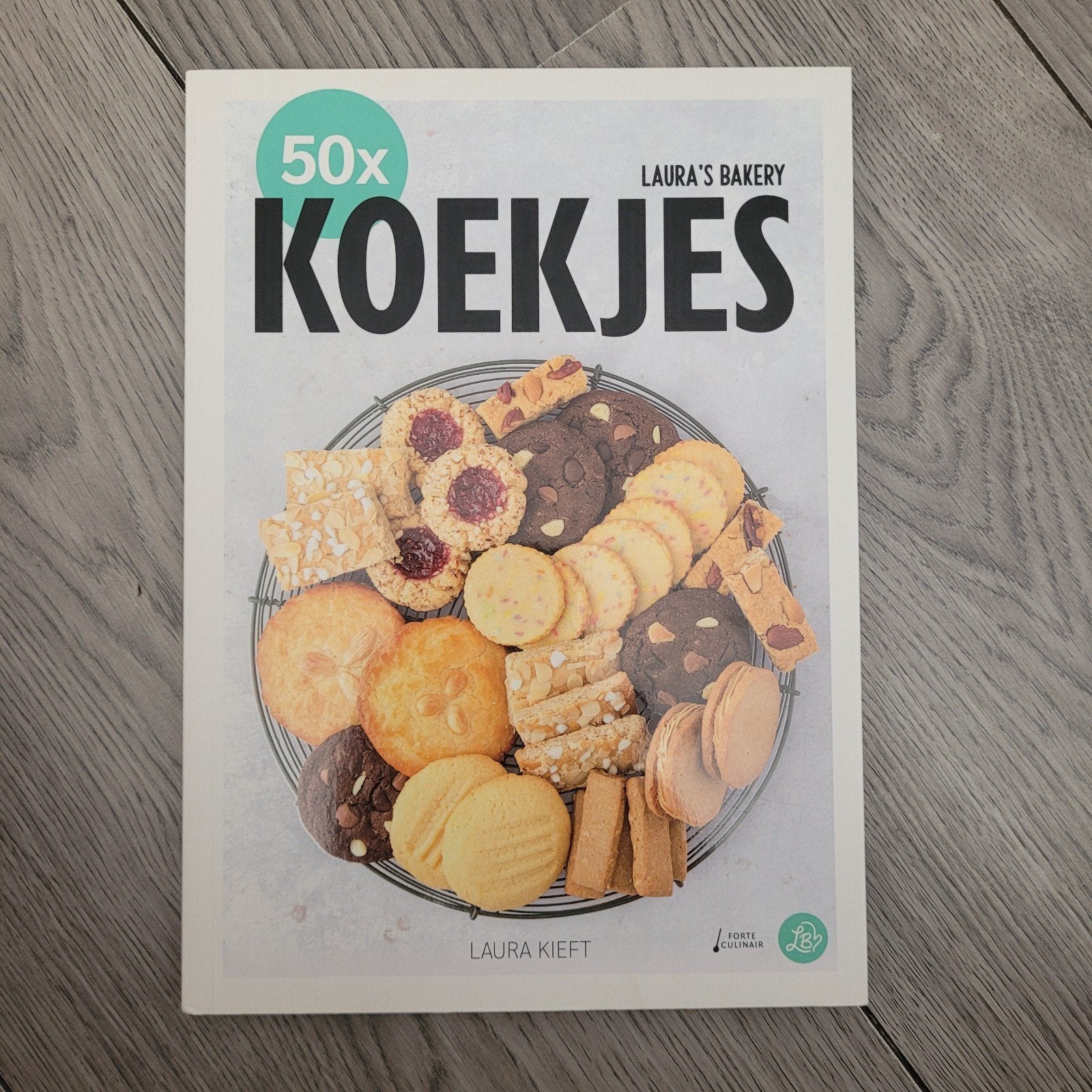 50x Koekjes - Laura's Bakery: Makkelijke recepten, Ophalen of Verzenden, Zo goed als nieuw, Laura Kieft, Taart, Gebak en Desserts