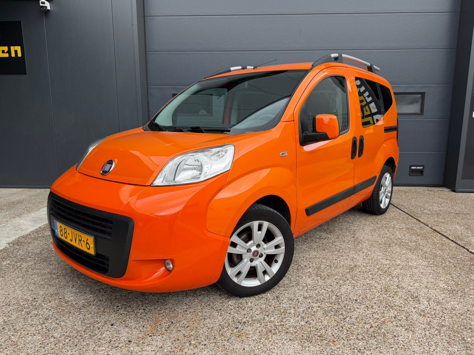 Fiat Qubo 1.4 Dynamic 54KW 5DRS 2009 Oranje Airco Apk Nap, Auto's, Fiat, Voorwielaandrijving, Zwart, 400 kg, Origineel Nederlands