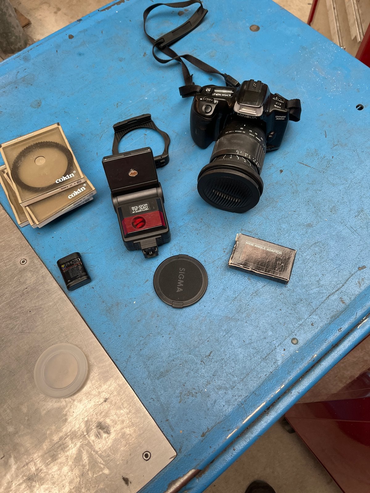 Minolta Dynax 300si met Sigma 28-200 lens en filters, Ophalen of Verzenden, Gebruikt, Spiegelreflex, Minolta