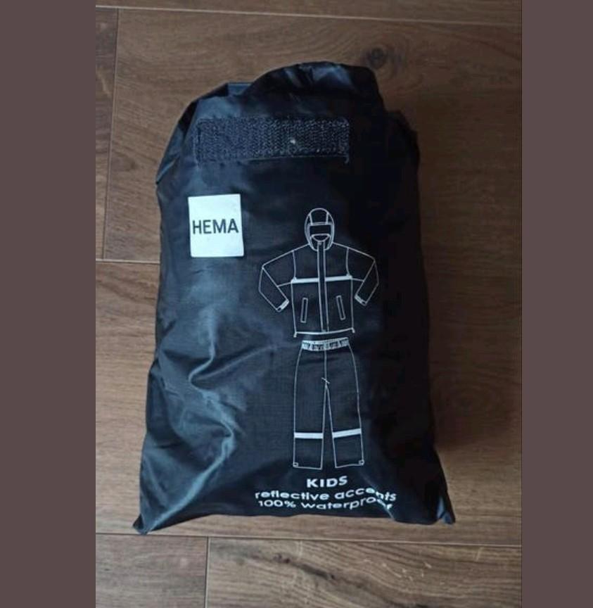Te koop regenpak 146/152 HEMA zgan, Caravans en Kamperen, Regenkleding, Ophalen of Verzenden, Zo goed als nieuw