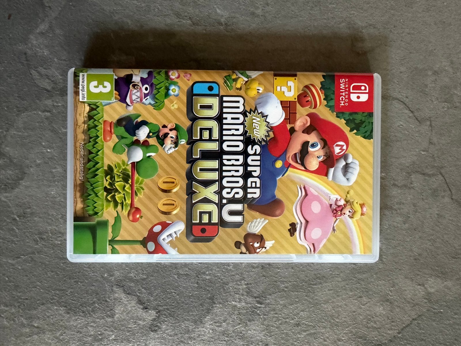 New Super Mario Bros. U Deluxe - Nintendo Switch, Spelcomputers en Games, Ophalen, Eén computer, Zo goed als nieuw, Platform