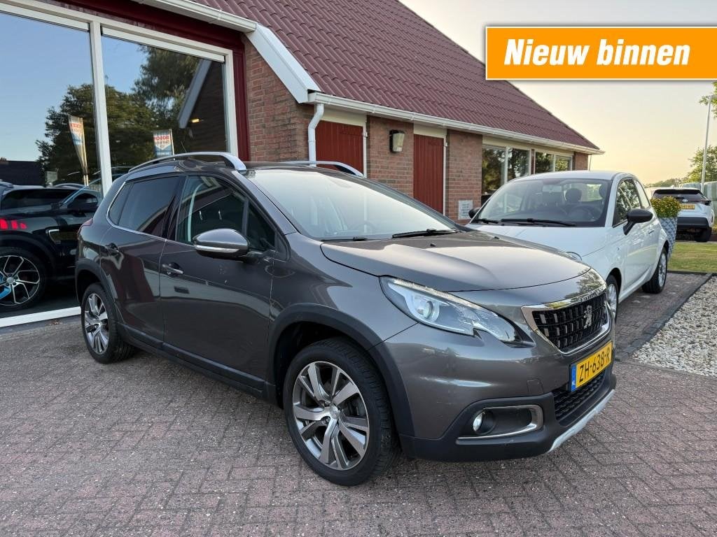 Peugeot 2008 1.2 PureT Allure RIJKLAAR!! Orig. NL/Panoramada, Auto's, Parkeersensor, 1199 cc, Met garantie (alle), 49 €/maand