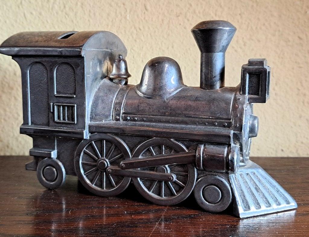 Sierlijke metalen spaarpot van een stoomlocomotief, Ophalen of Verzenden, Gebruikt, Metaal of Blik, Vervoermiddel
