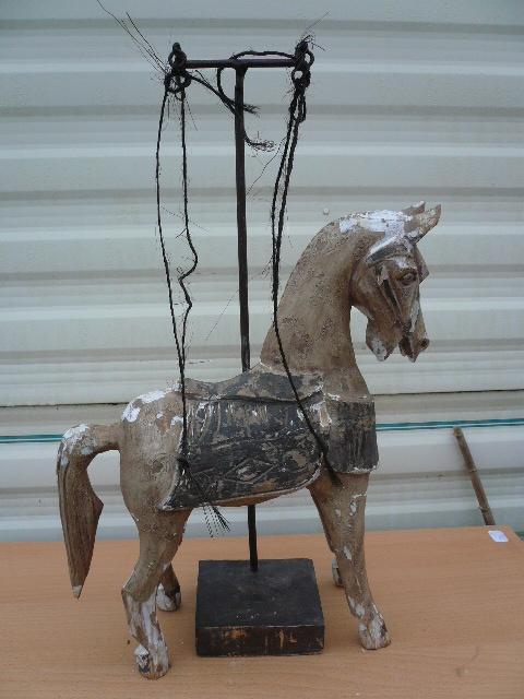 Oude houten paard, Ophalen