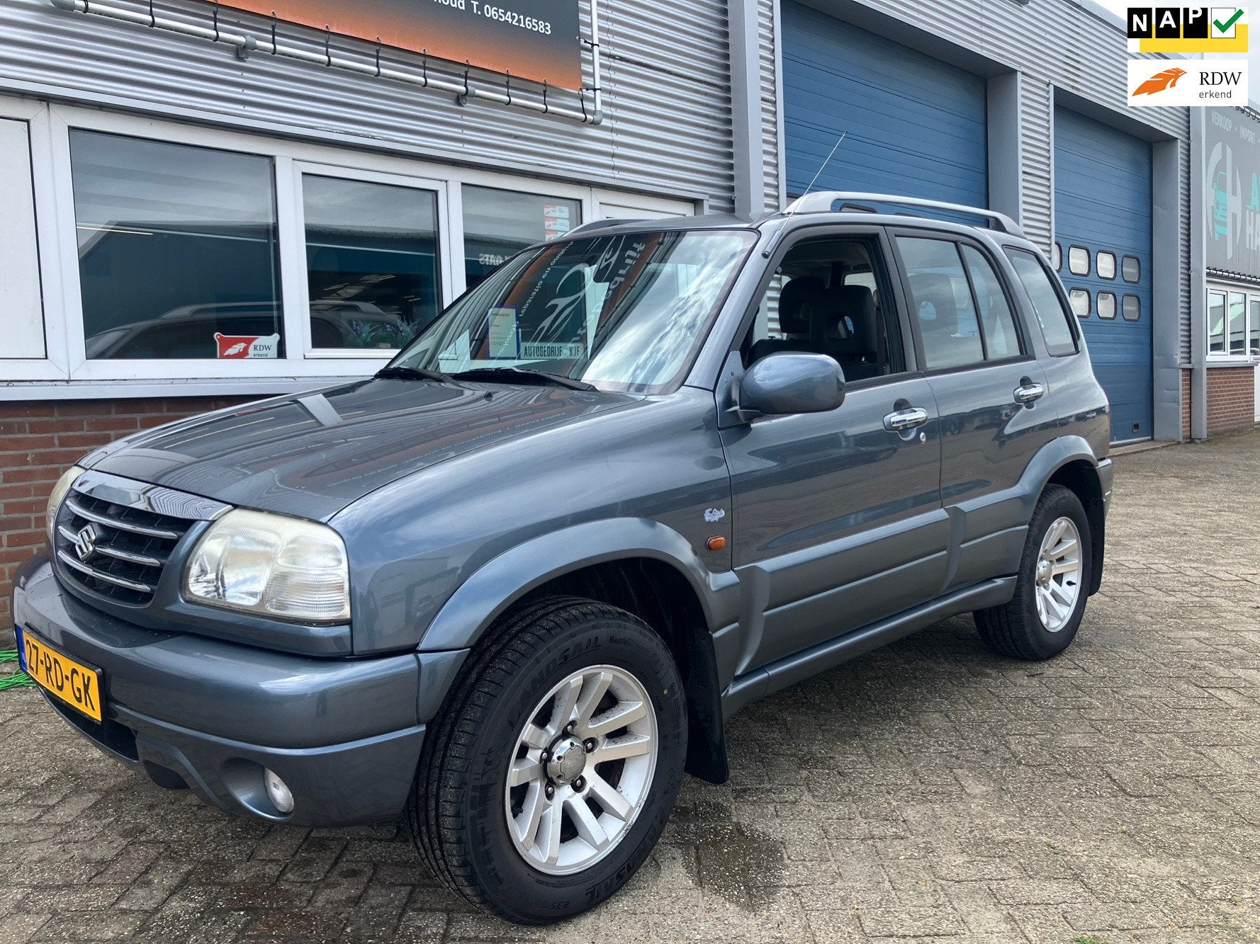 Suzuki Grand Vitara 2.0 FreeStyle-3 4x4 Airco, Auto's, Suzuki, 1330 kg, Zwart, 4 cilinders, Grand Vitara