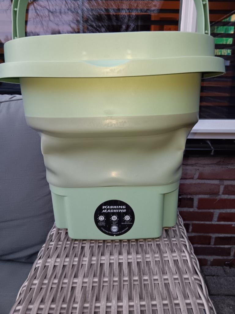 Mini Camping wasmachine, Ophalen