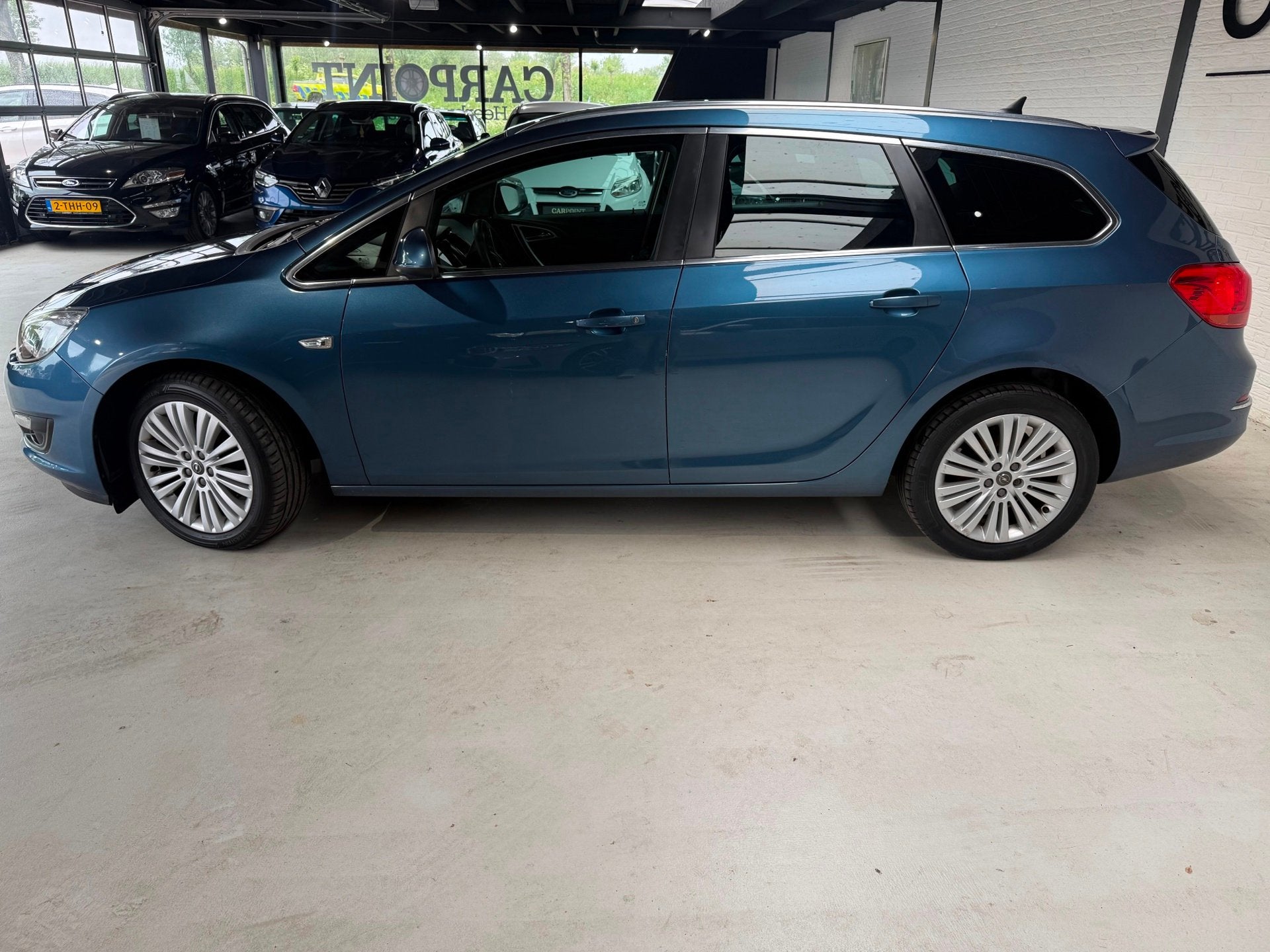 Opel Astra Sports Tourer 1.4 Turbo Design Edition 2014 Camer, Auto's, Voorwielaandrijving, Euro 5, Gebruikt, 4 cilinders