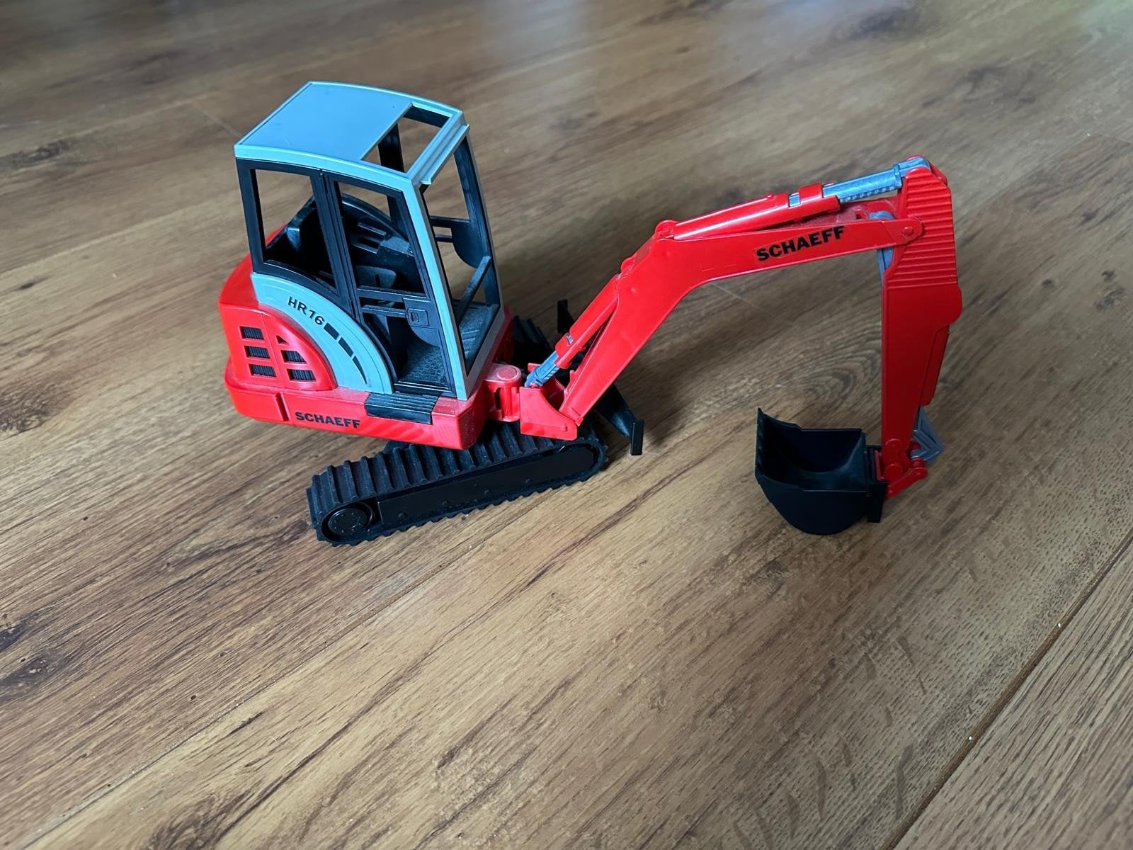 Schaeff HR16 Speelgoed Graafmachine - Zo goed als nieuw, Ophalen of Verzenden, Zo goed als nieuw