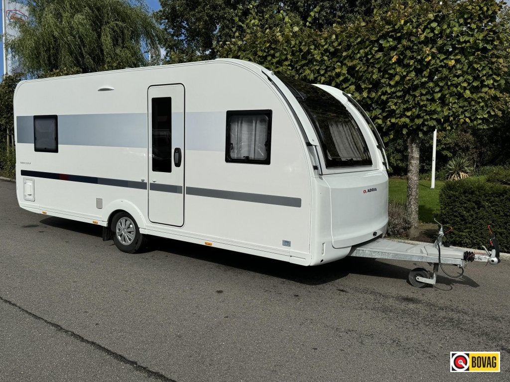 Adria Adora 522 UP verkocht, Caravans en Kamperen, Rondzit, Bedrijf, 5 tot 6 meter, Schokbreker