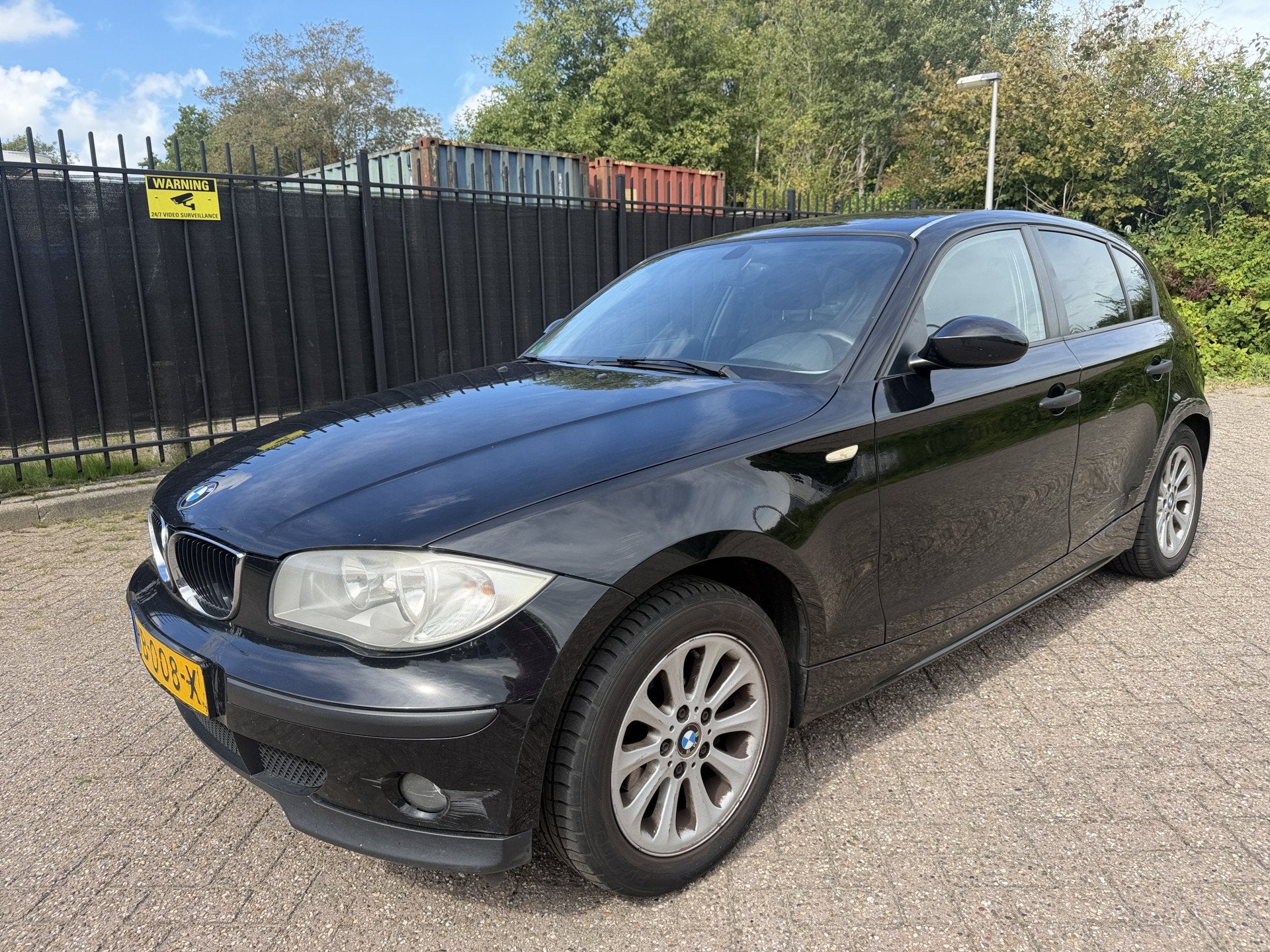 BMW 1-serie 116i Executive 5 Drs (bj 2006), Auto's, Dealer onderhouden, Achterwielaandrijving, Gebruikt, Zwart