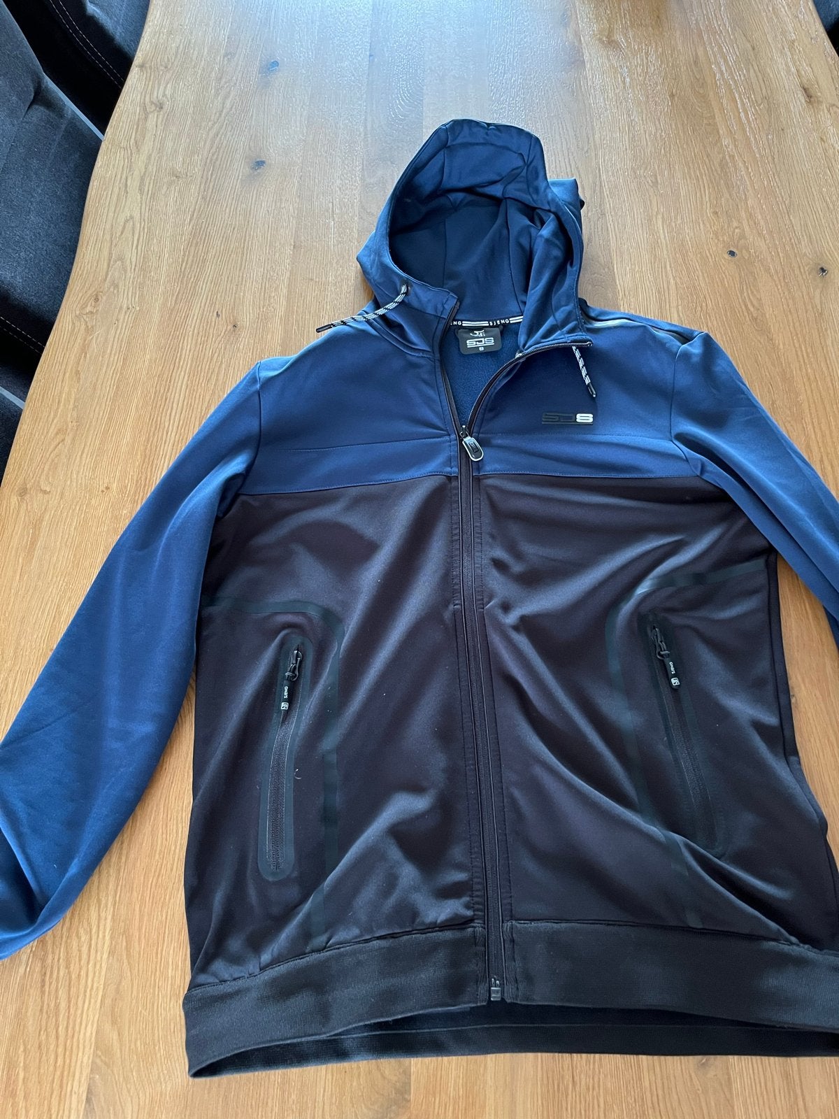 SJS Sjeng Sportvest met capuchon - Maat M nieuwprijs 79,99€, Ophalen of Verzenden, Zo goed als nieuw, Algemeen, Maat 48/50 (M)