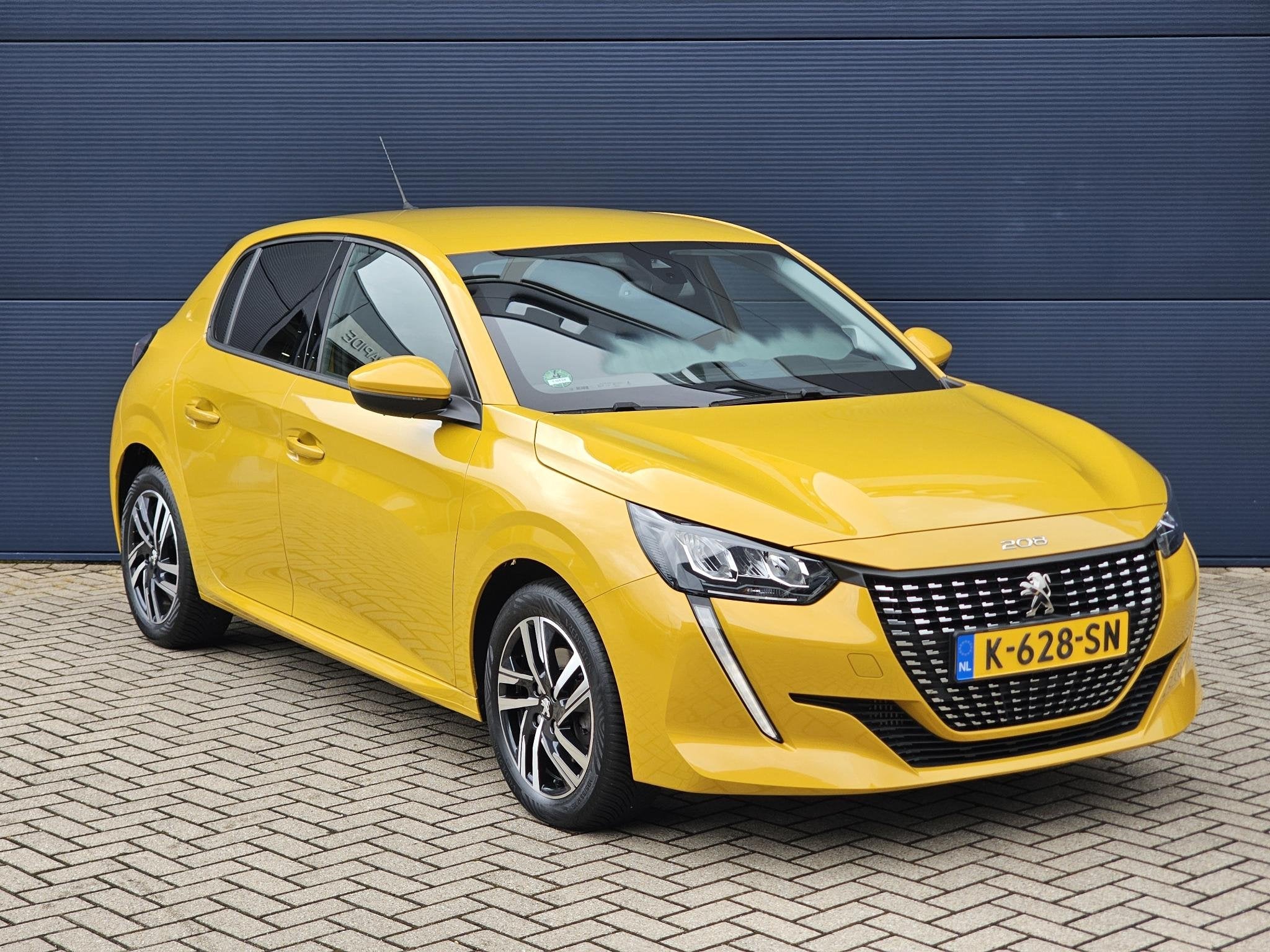 Peugeot 208 1.2 PureTech 100pk Allure Pack | Parkeercamera |, Auto's, Voorwielaandrijving, 101 pk, Gebruikt, Leder en Stof