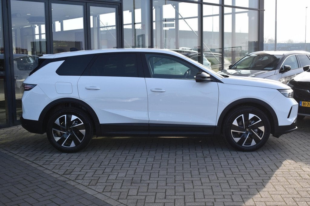 Opel Grandland 1.2 Turbo Hybrid GS VOORRAAD KORTING, Auto's, Opel, Stof, Euro 6, 1199 cc, Wit