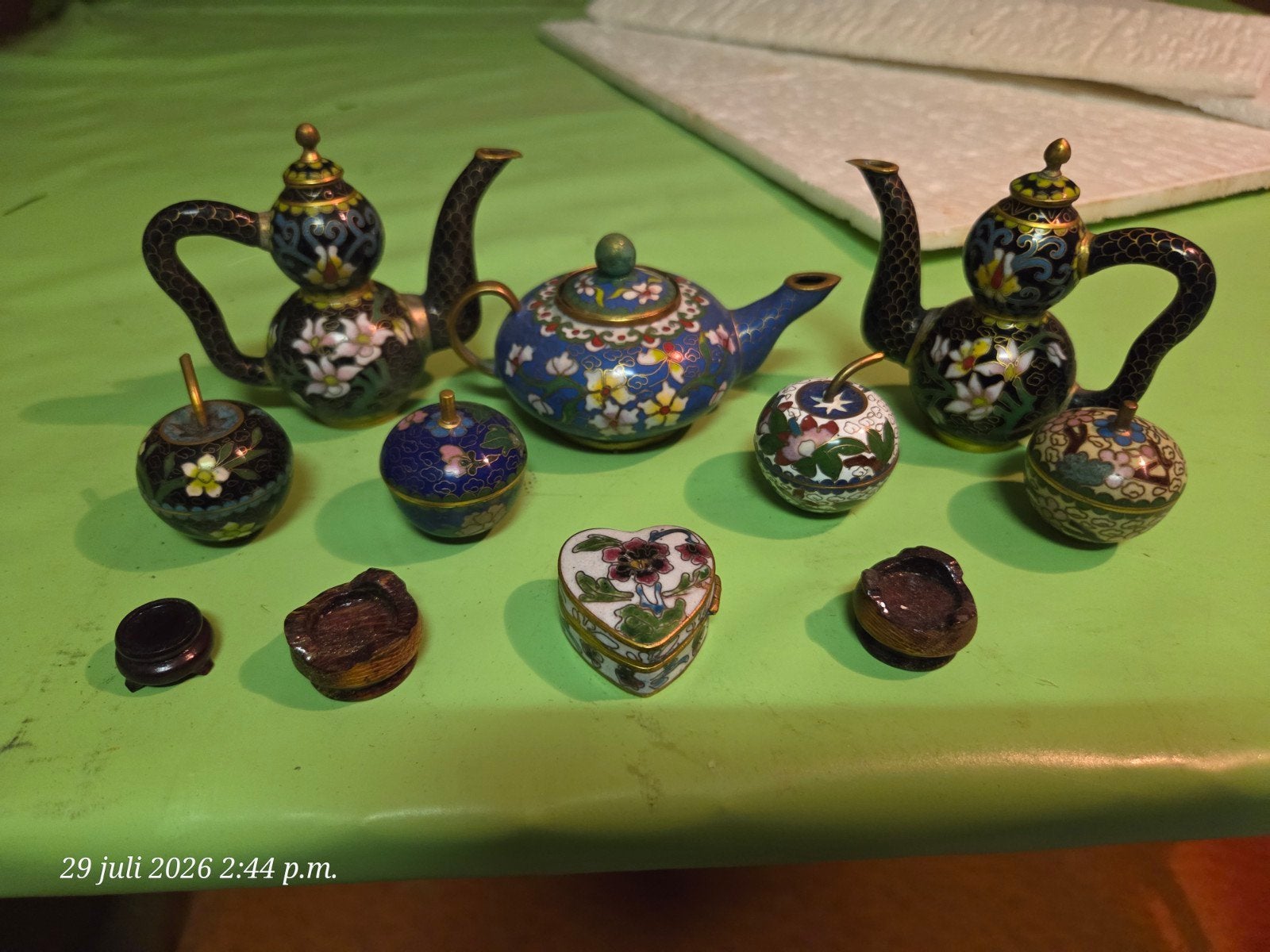 Set van Cloisonné theepotten en decoratieve items, Ophalen